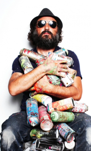 Thierry Guetta aka. Mr. Brainwash covered in his used spray cans
